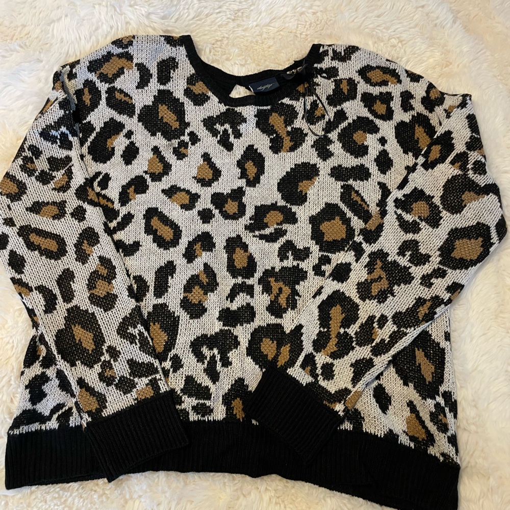 Cute sweater with open back